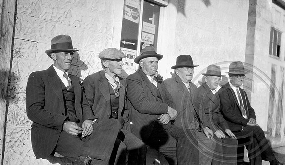 Group of men on street, Brainerd, NE 1934